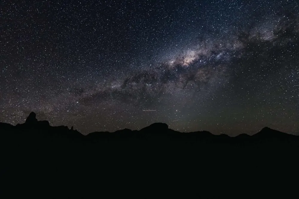 The Milky Way above a mountain silhouette